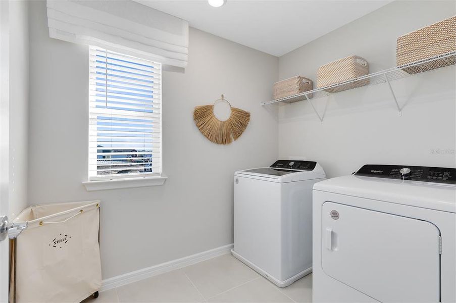 Furnished interior view inside a new home in Tohoqua, Kissimmee (Image 7).