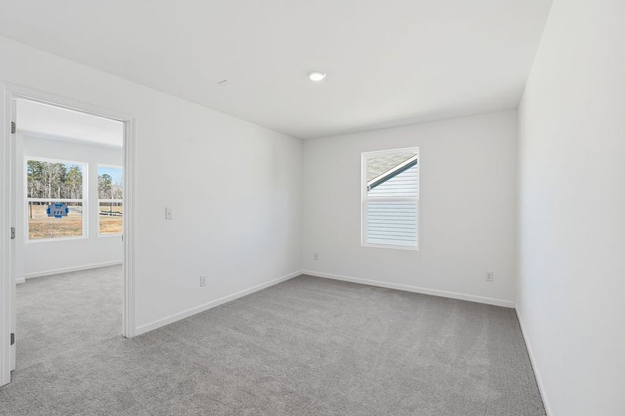 Representative unfurnished interior of a home built from the Norcross by Taylor Morrison in Windance Lake, Loganville (Image 20).