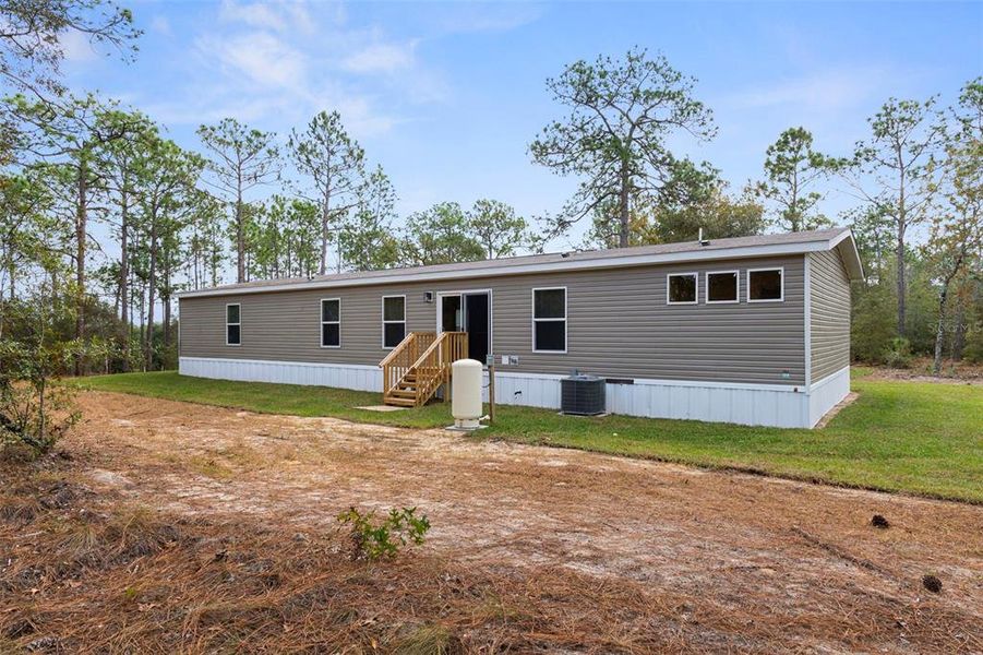 Exterior details and patio area of a home in , Brooksville (Image 18). Exterior details and patio area of a home in , Brooksville (Image 18).