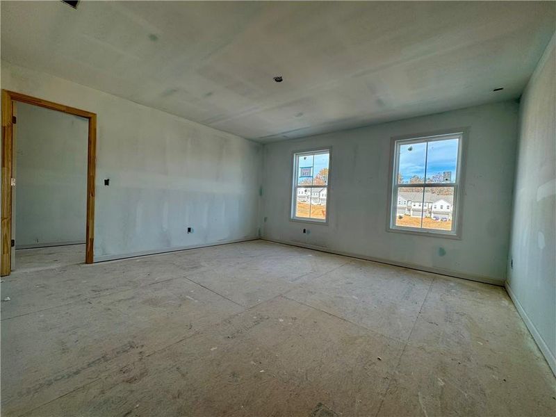 In-progress construction of a new home in Eastlyn Crossing - Single Family, Flowery Branch, GA (Image 6).