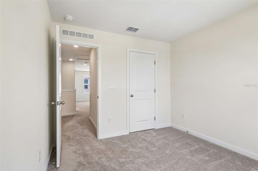 Spacious, unfurnished interior of a new home in Cyrene at Harmony, St. Cloud (Image 24). Spacious, unfurnished interior of a new home in Cyrene at Harmony, St. Cloud (Image 24).