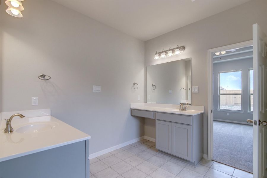 Representative furnished interior of a home built from the Floor Plan 2922 by Colina Homes in Grand Magnolia, Magnolia (Image 12).