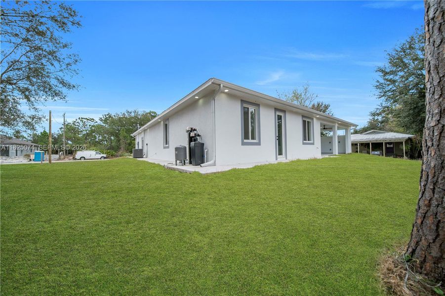 Exterior details and patio area of a home in , Lehigh Acres (Image 3).