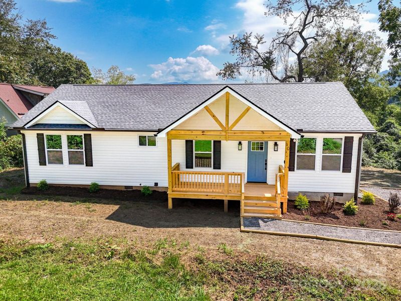 Front exterior of a new home in , Asheville, NC, highlighting curb appeal (Image 19).