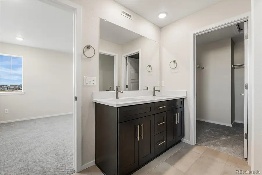 Furnished interior view inside a new home in Barefoot Village, Firestone (Image 8).