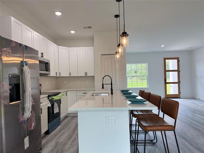 Furnished interior view inside a new home in , Ocala (Image 9).