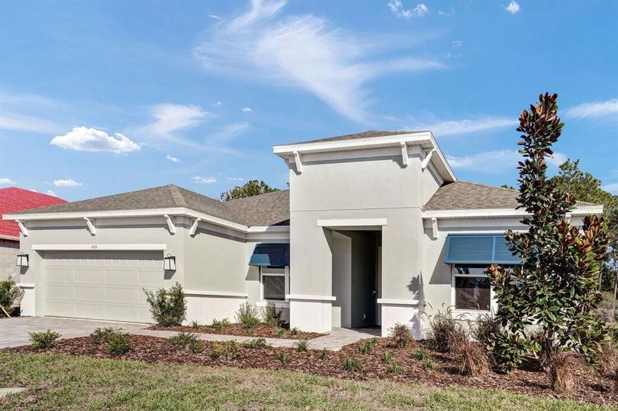 Front exterior of a new home in Esplanade at Center Lake Ranch, St. Cloud, FL, highlighting curb appeal (Image 1).