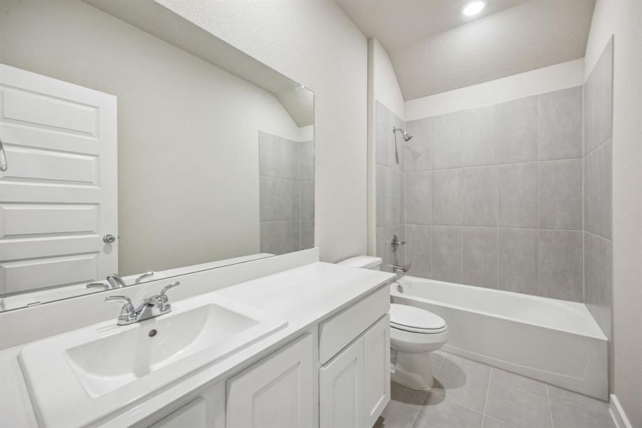 Bathroom in the Wimbledon home plan by Trophy Signature Homes – REPRESENTATIVE PHOTO Bathroom in the Wimbledon home plan by Trophy Signature Homes – REPRESENTATIVE PHOTO