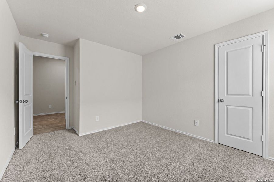 Spacious, unfurnished interior of a new home in Navarro Fields, Seguin (Image 20).