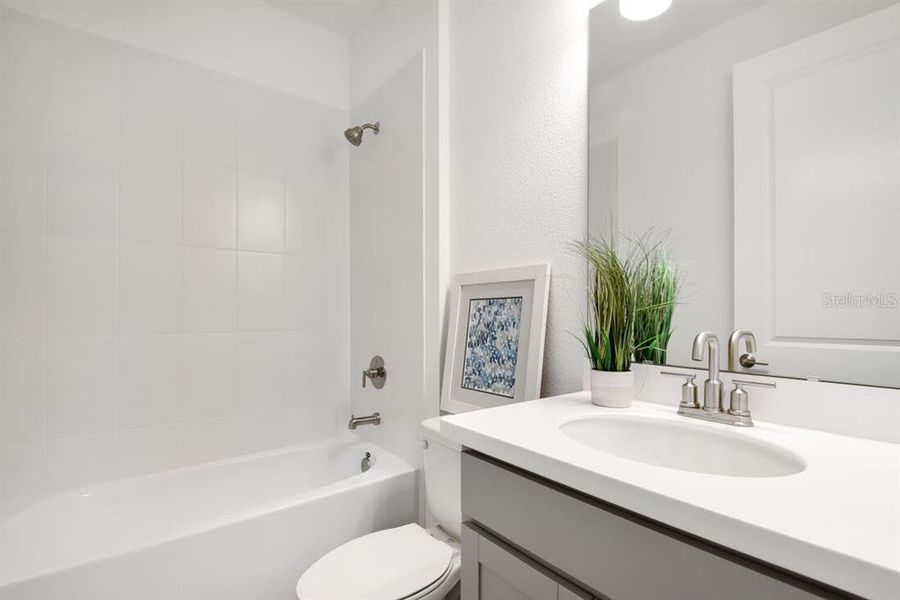 Furnished interior view inside a new home in Ardisia Park, New Smyrna Beach (Image 39).