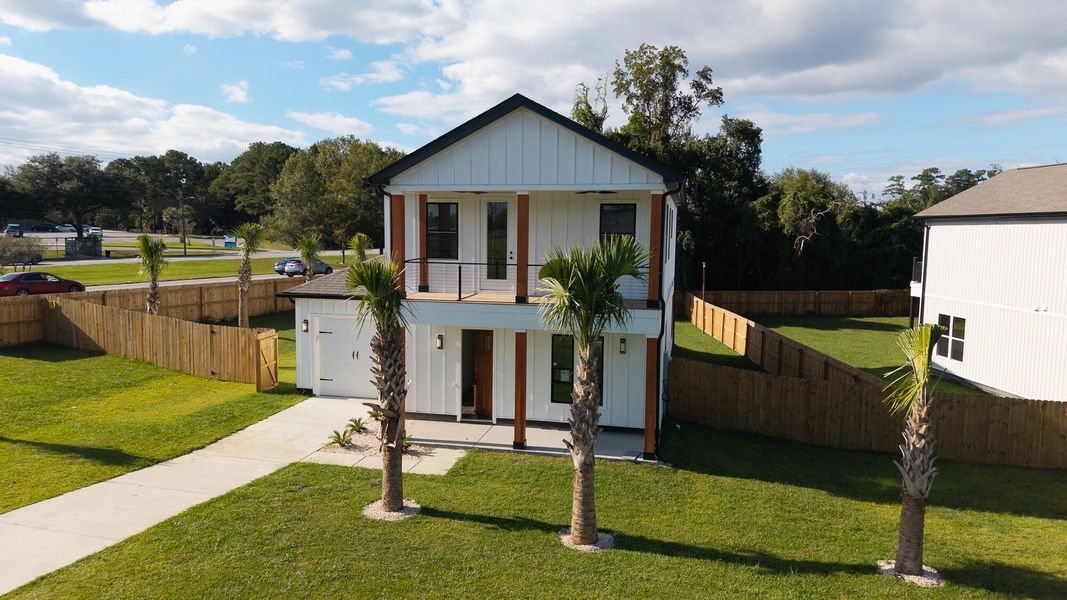 Front exterior of a new home in , North Charleston, SC, highlighting curb appeal (Image 30).