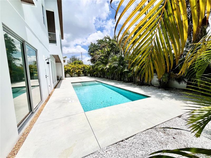Exterior details and patio area of a home in , Sarasota (Image 26).