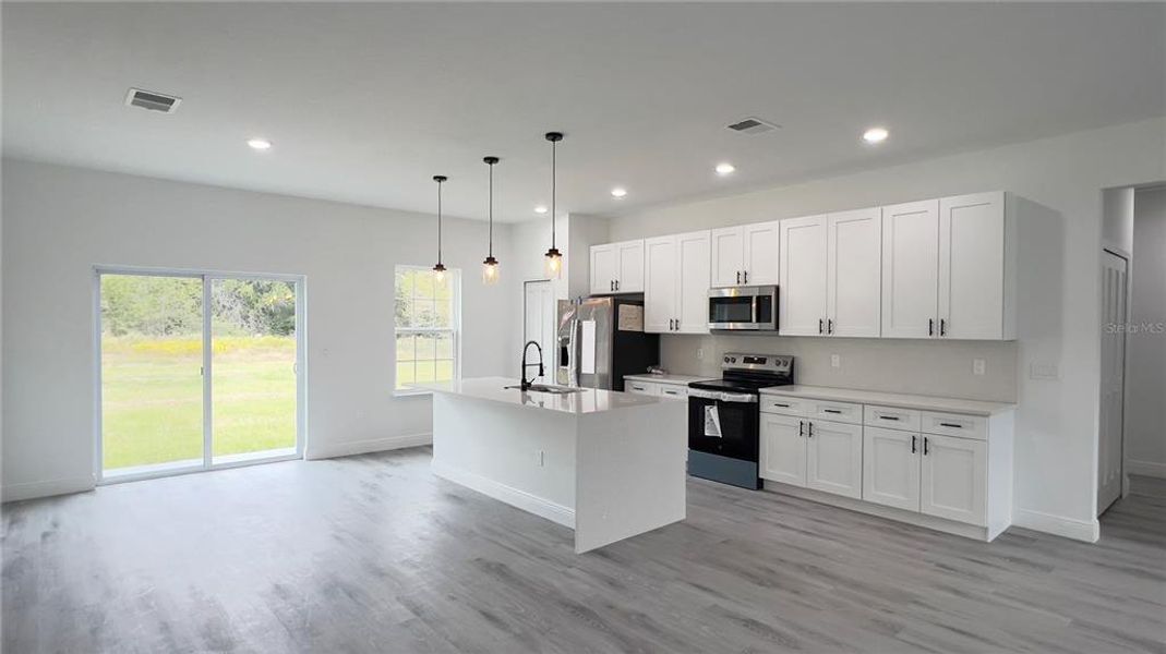 Furnished interior view inside a new home in , Ocala (Image 13).