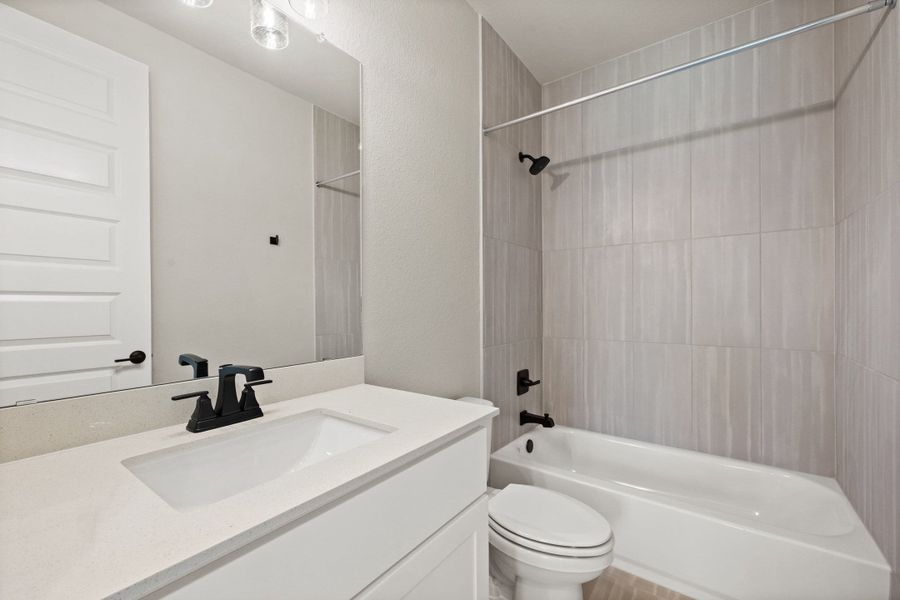 Furnished interior view inside a new home in Terrace Collection At Turner's Crossing, Buda (Image 17).