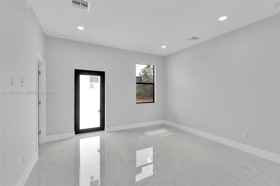 Spacious, unfurnished interior of a new home in , Lehigh Acres (Image 25).