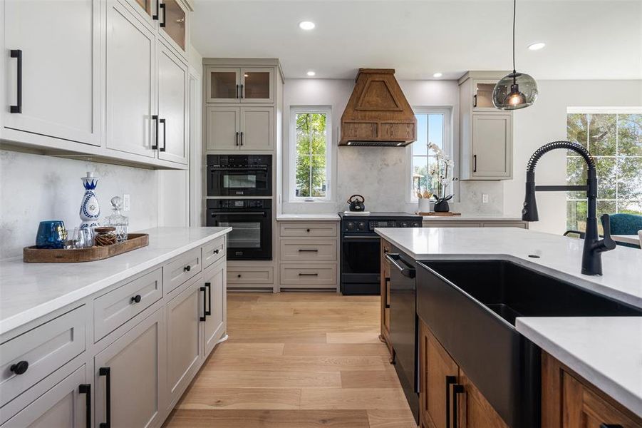 Beautiful black farm sink and black stainless steel appliances Beautiful black farm sink and black stainless steel appliances