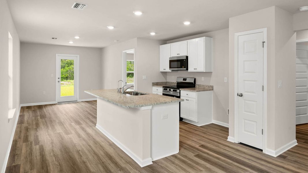 Furnished interior view inside a new home in Chateau Nemours, Port Saint Joe (Image 6).