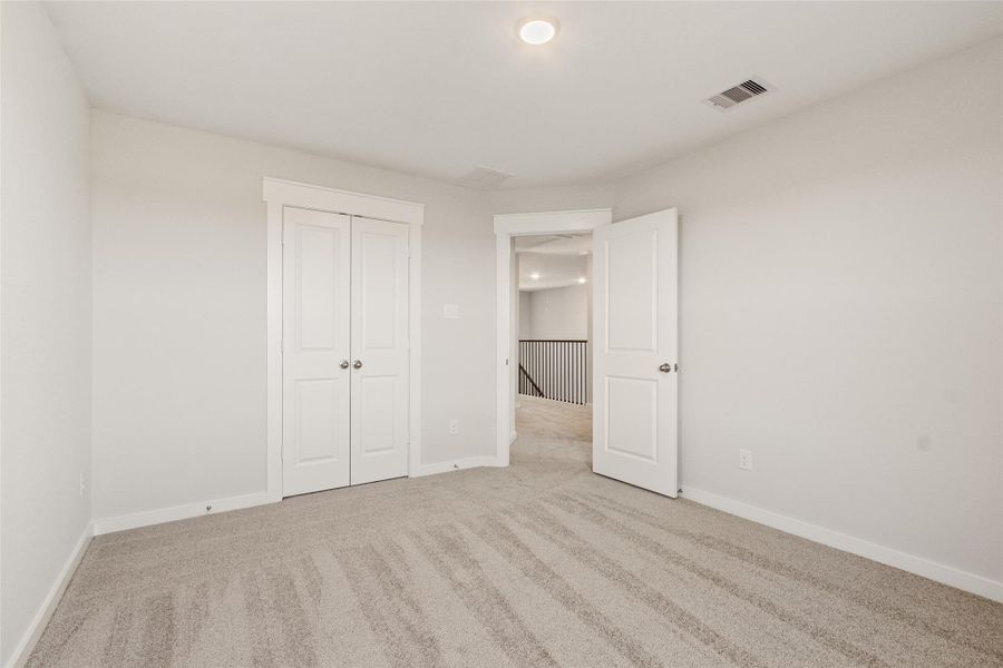 Spacious, unfurnished interior of a new home in Sunterra, Katy (Image 27).