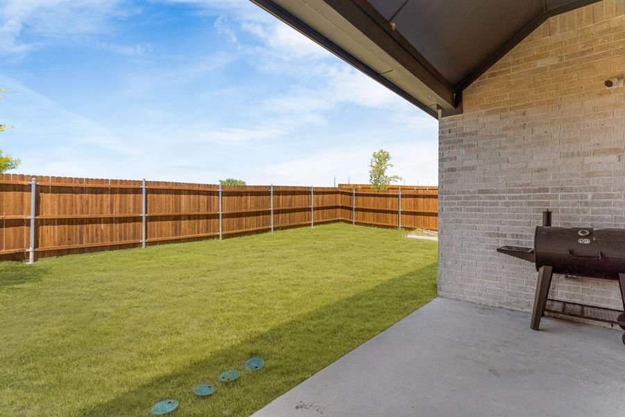 View of yard featuring a patio area View of yard featuring a patio area