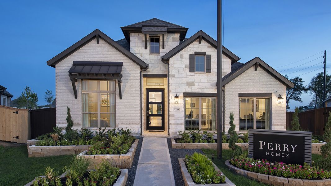 Front exterior of a new home in Meadows of Mill Creek, Seguin, TX, highlighting curb appeal (Image 23).