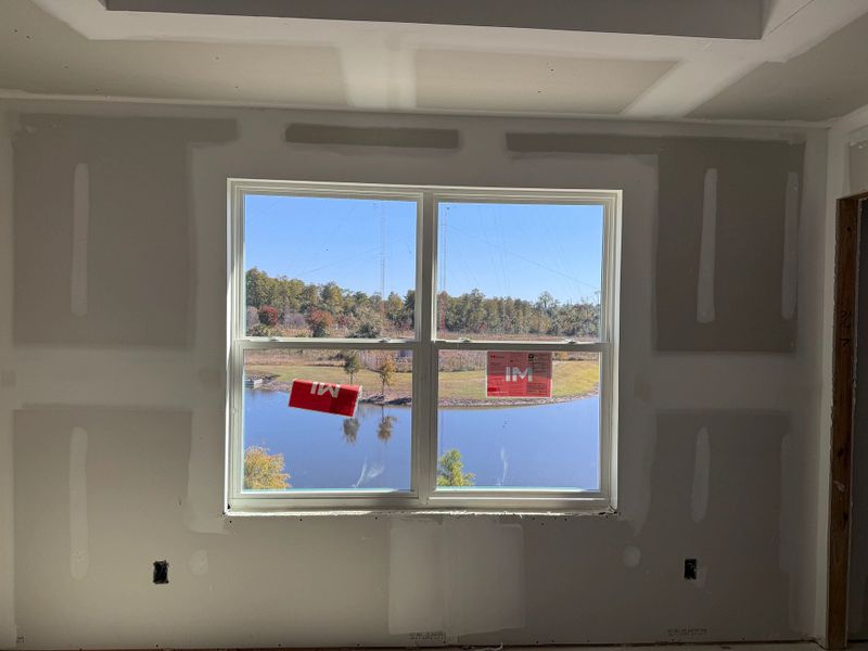 Beautiful pond view from the back of the home