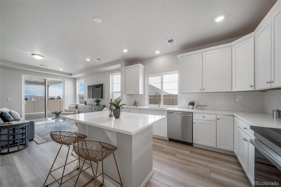 Furnished interior view inside a new home in The Reserve, Aurora (Image 3).