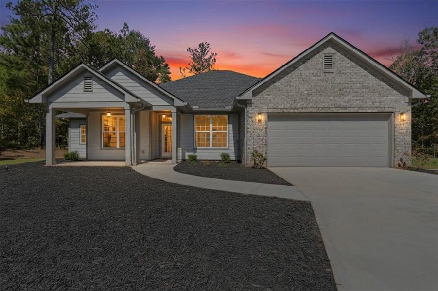 Front exterior of a new home in , Gray, GA, highlighting curb appeal (Image 1).