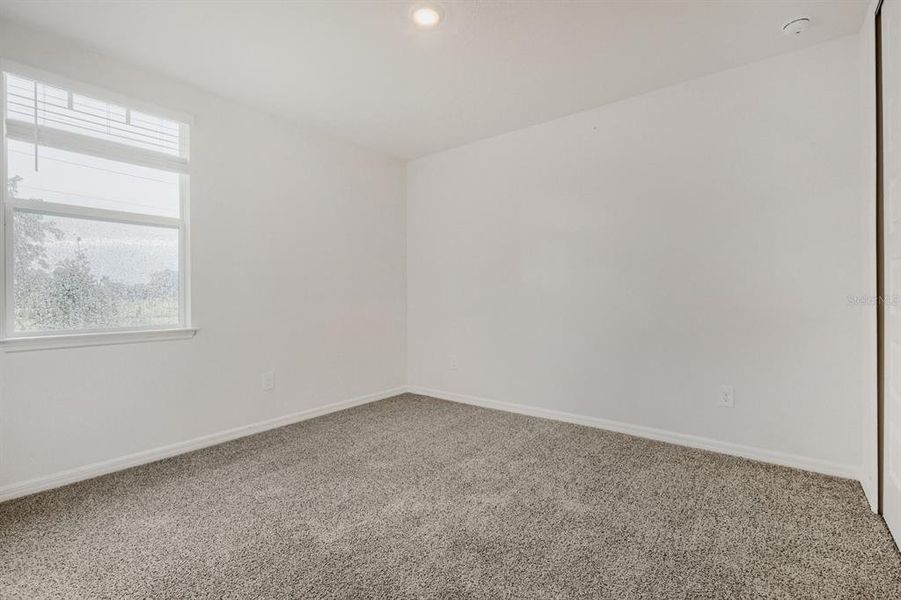 Spacious, unfurnished interior of a new home in The Grove at Stuart Crossing - Signature Series, Bartow (Image 28). Spacious, unfurnished interior of a new home in The Grove at Stuart Crossing - Signature Series, Bartow (Image 28).