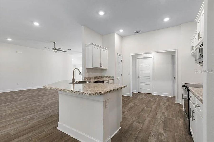 Furnished interior view inside a new home in Palm Coast, Palm Coast (Image 6). Furnished interior view inside a new home in Palm Coast, Palm Coast (Image 6).