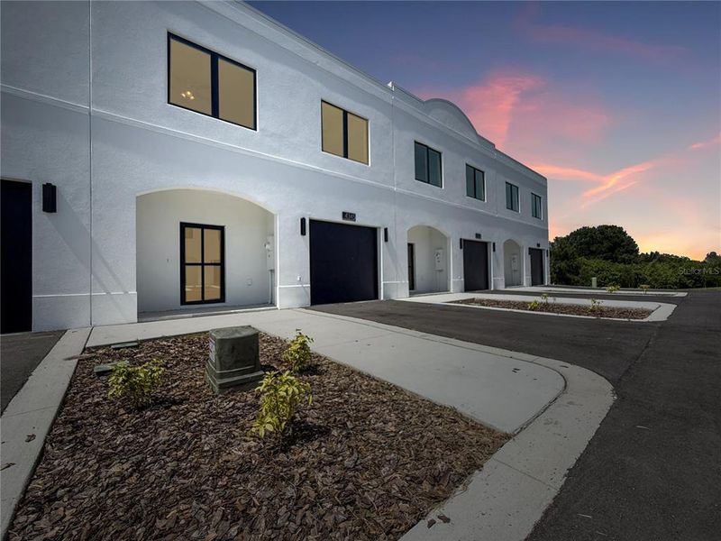 Front exterior of a new home in , Tampa, FL, highlighting curb appeal (Image 2).