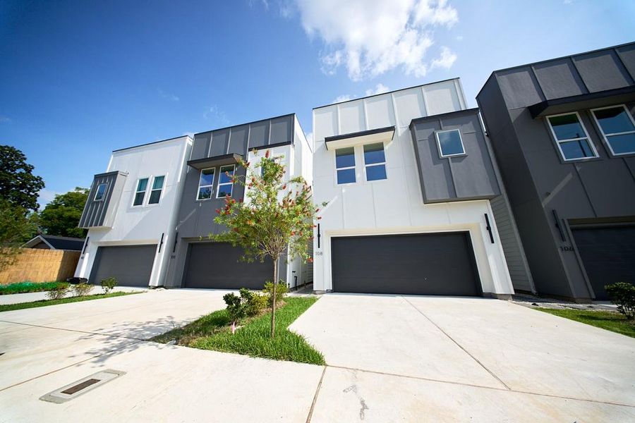 Modern exterior with private driveway. Modern exterior with private driveway.