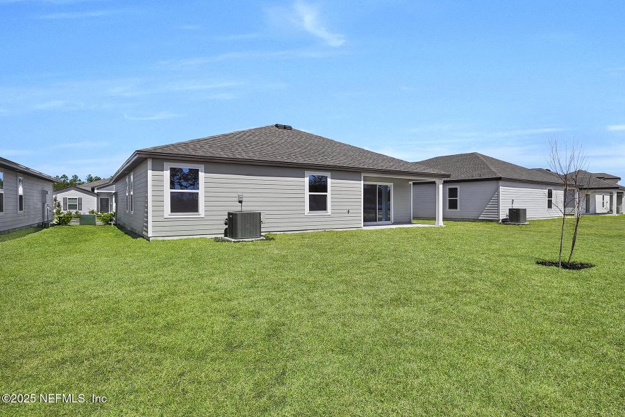 Front exterior of a new home in , Jacksonville, FL, highlighting curb appeal (Image 2). Front exterior of a new home in , Jacksonville, FL, highlighting curb appeal (Image 2).