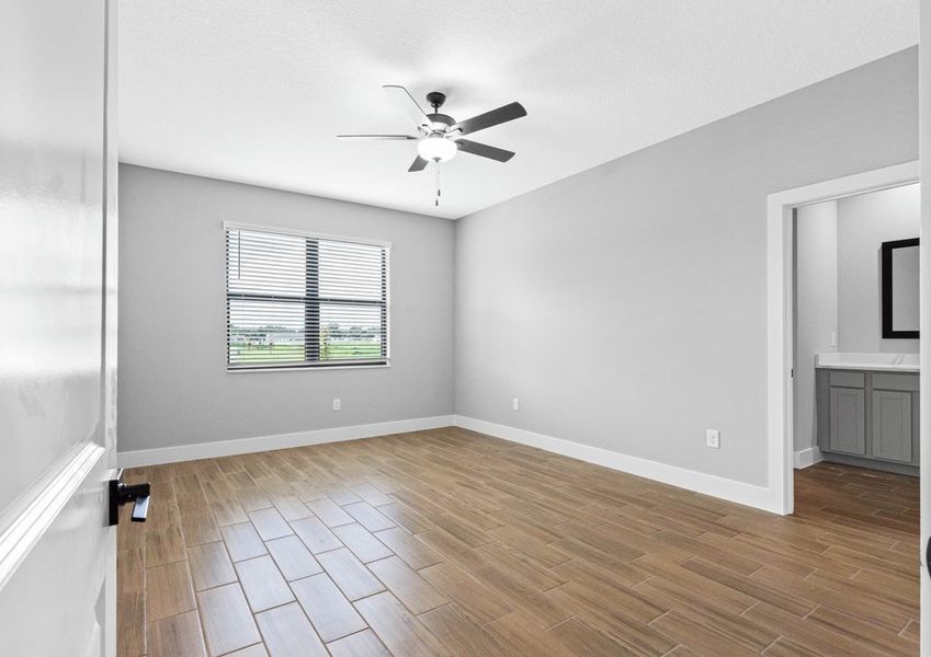 Rest and relaxation await in the master bedroom