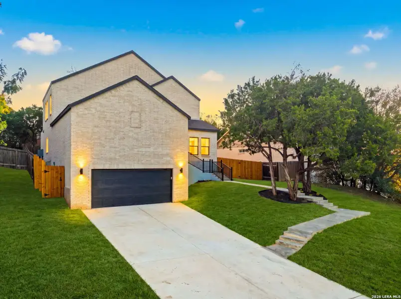 Front exterior of a new home in , San Antonio, TX, highlighting curb appeal (Image 1). Front exterior of a new home in , San Antonio, TX, highlighting curb appeal (Image 1).
