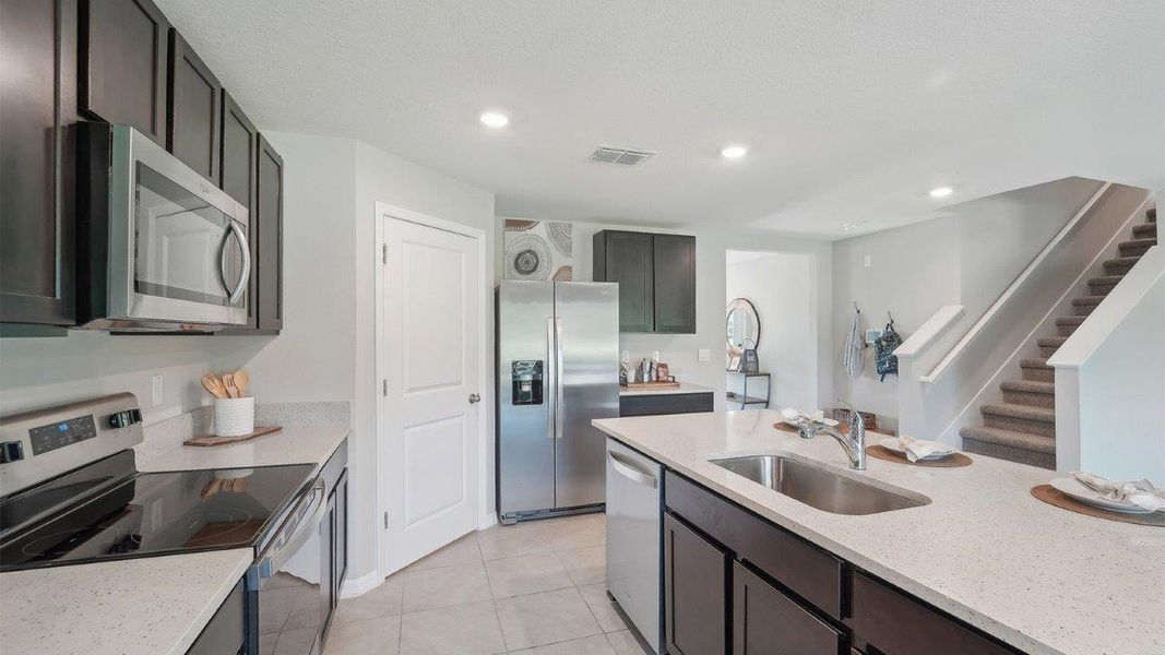 Furnished interior view inside a new home in Abbott Park, Zephyrhills (Image 6).