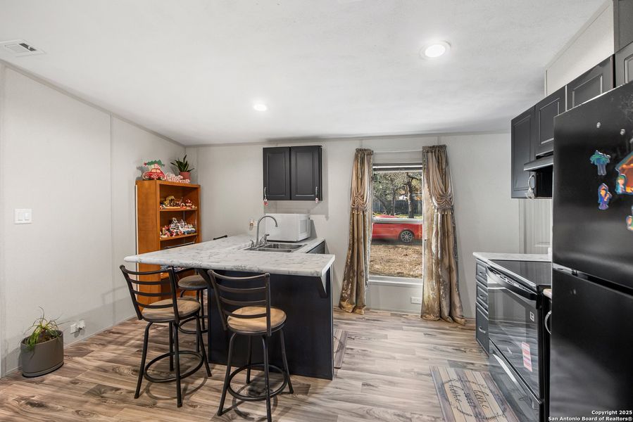 Furnished interior view inside a new home in , Elmendorf (Image 13).