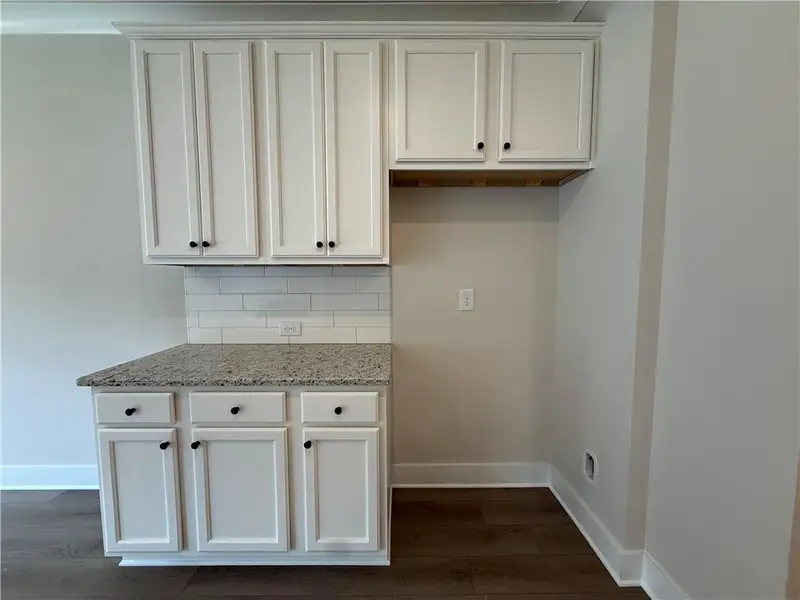 Furnished interior view inside a new home in The Towns at Auburn Station East, Auburn (Image 5).