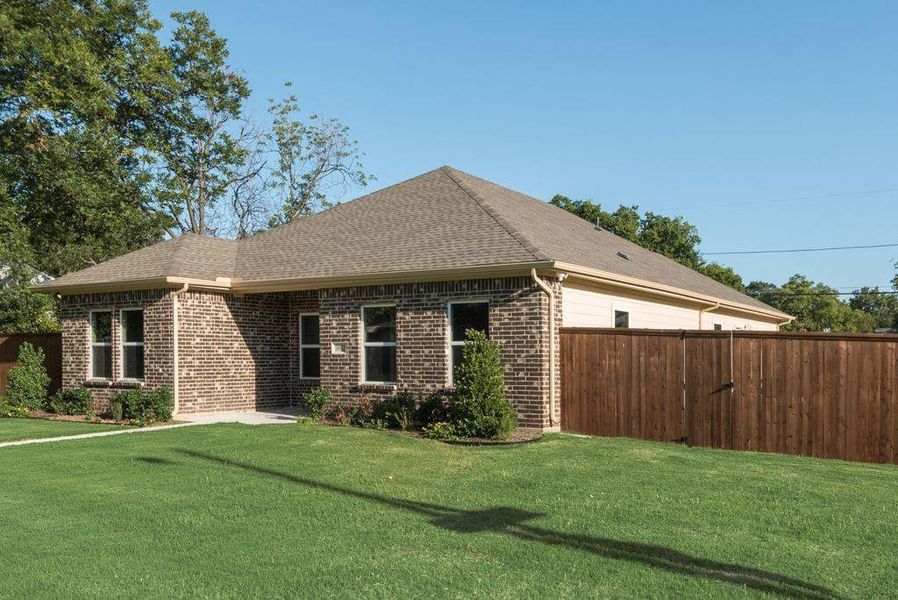 View of front of house with a front yard