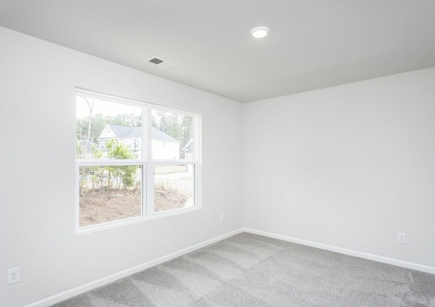 Secondary bedrooms are filled with natural lighting. Secondary bedrooms are filled with natural lighting.