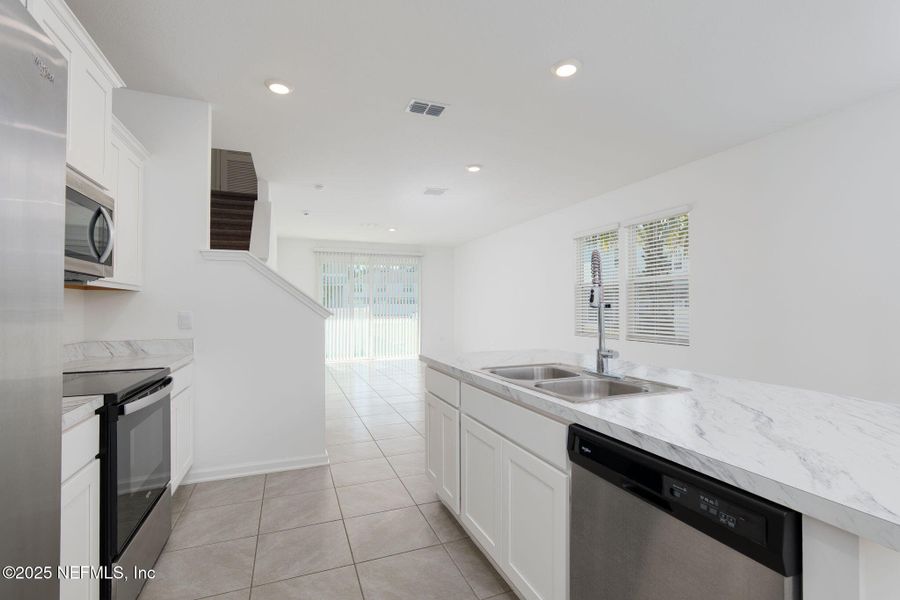 Furnished interior view inside a new home in Equinox East, Jacksonville (Image 8).