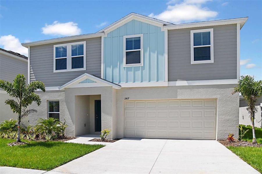 Front exterior of a new home in Wynnstone, Davenport, FL, highlighting curb appeal (Image 1).