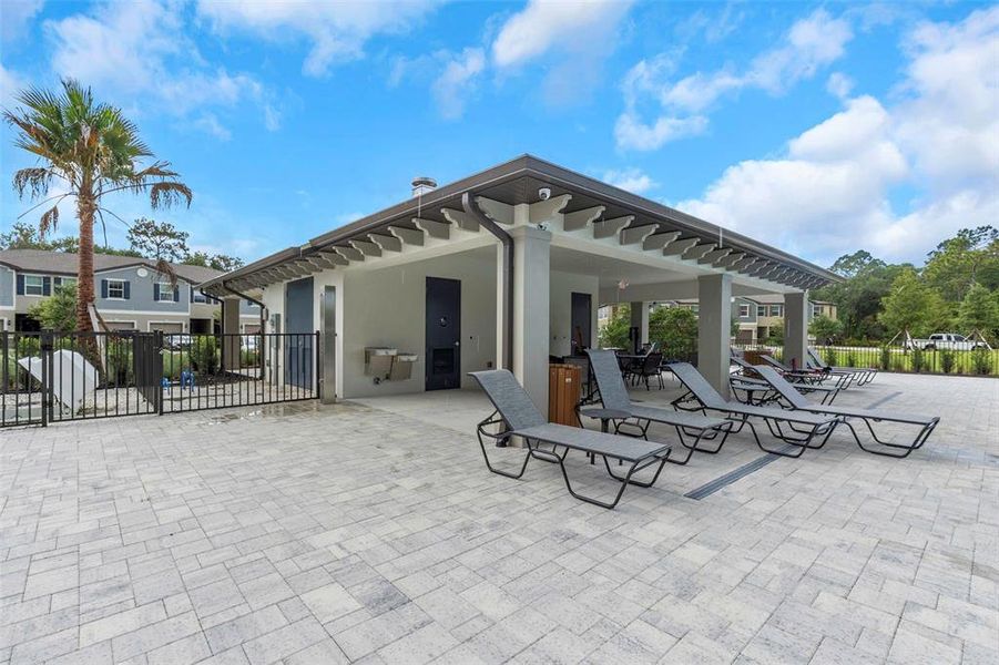Front exterior of a new home in , Land O' Lakes, FL, highlighting curb appeal (Image 2).