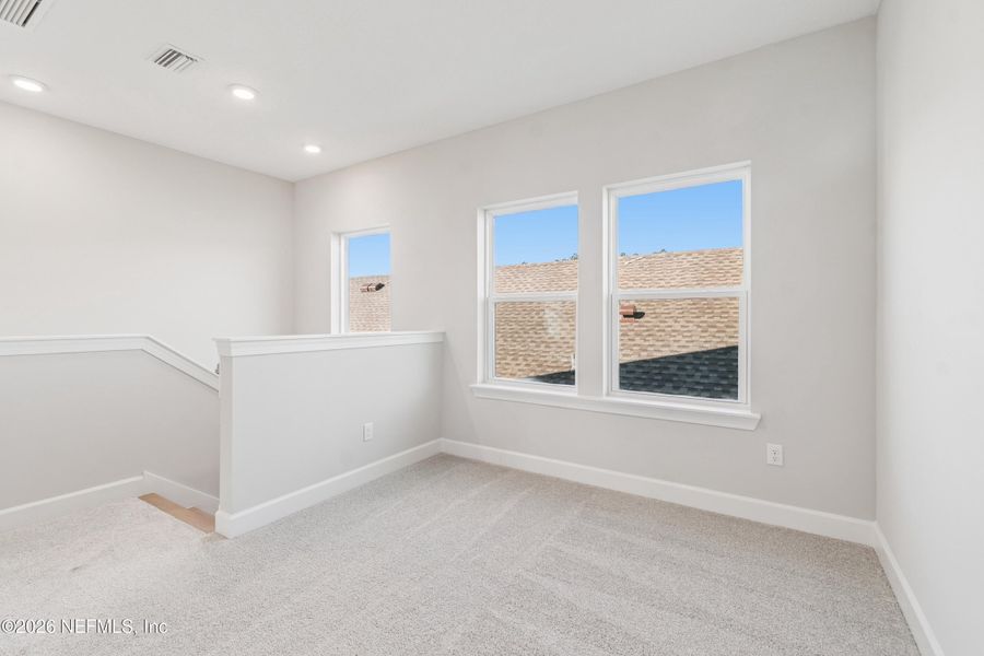 Spacious, unfurnished interior of a new home in Evergreen Island at Silverleaf - Executive, St. Augustine (Image 21).