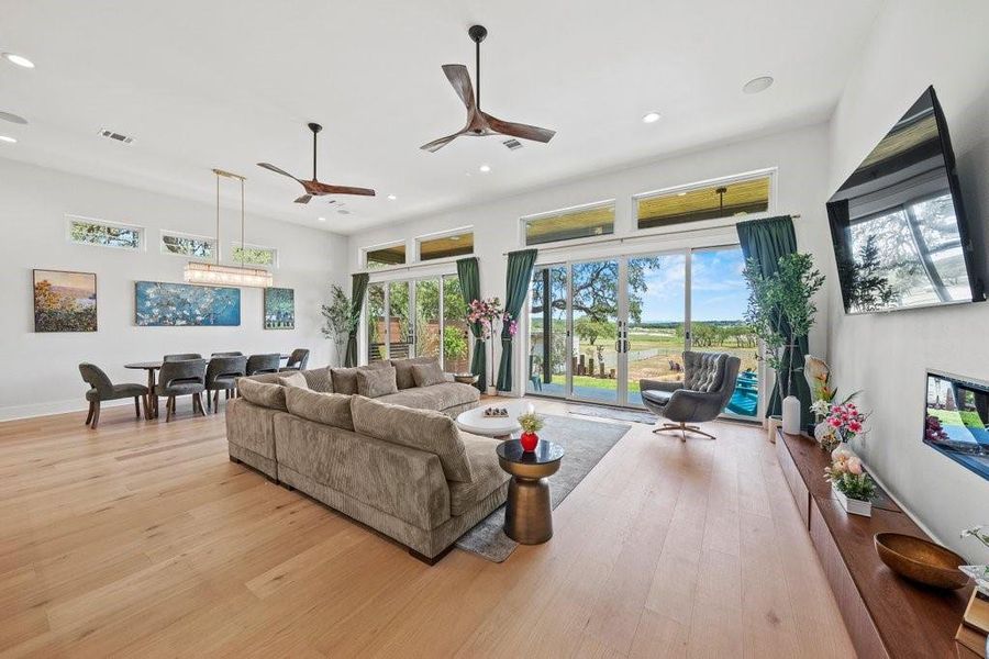 Spacious and light-filled living room with panoramic Hill Country views, soaring ceilings, and seamless indoor-outdoor flow. Perfectly designed for relaxing or entertaining, this open-concept space brings the beauty of Canyon Lake right to your doorstep