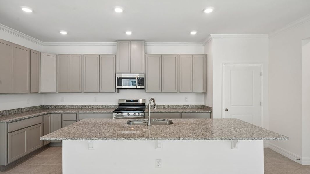 Furnished interior view inside a new home in Heritage Station, Punta Gorda (Image 8).