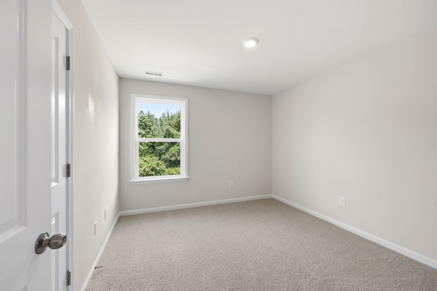 Spacious, unfurnished interior of a new home in The Farm at Neill's Creek, Lillington (Image 27).
