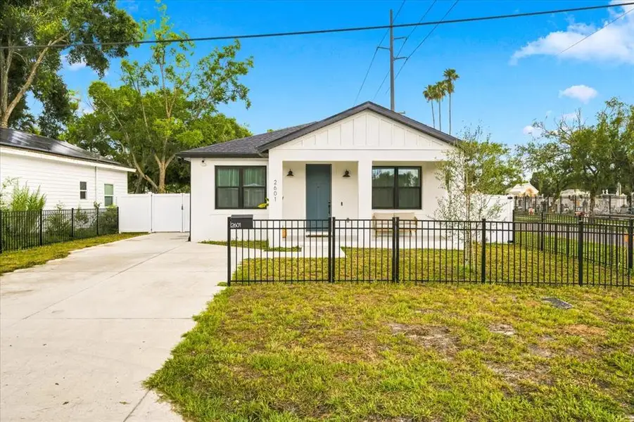 Front exterior of a new home in , Tampa, FL, highlighting curb appeal (Image 22). Front exterior of a new home in , Tampa, FL, highlighting curb appeal (Image 22).