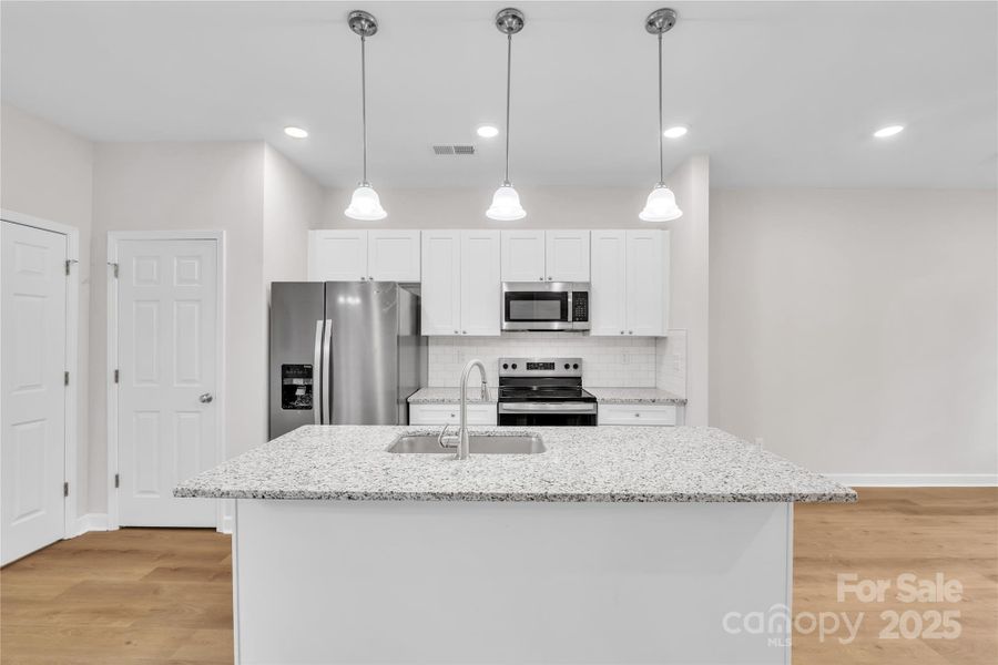 Furnished interior view inside a new home in , Statesville (Image 15).
