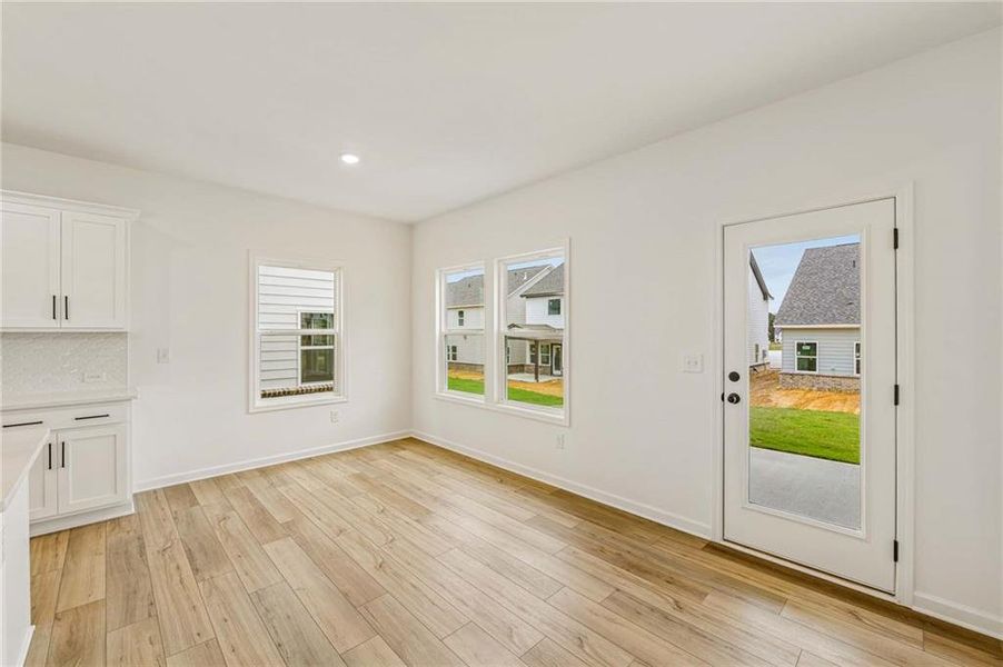 Spacious, unfurnished interior of a new home in Eastlyn Crossing, Flowery Branch (Image 20).