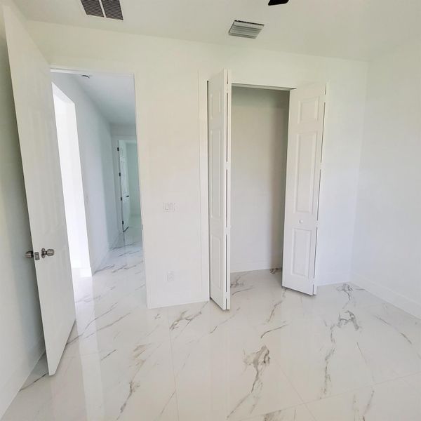 Spacious, unfurnished interior of a new home in , Okeechobee (Image 16).